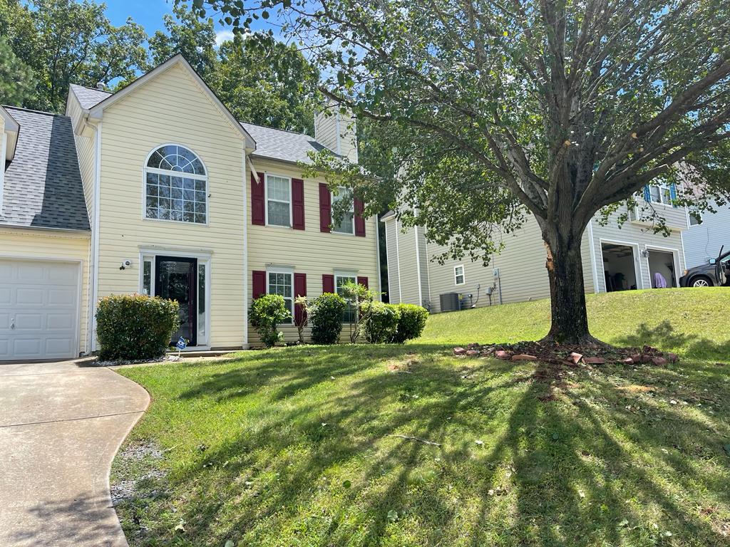 Well-maintained residential property with healthy lawn